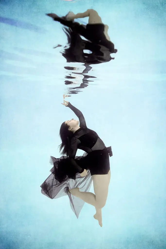 woman underwater during a photoshoot