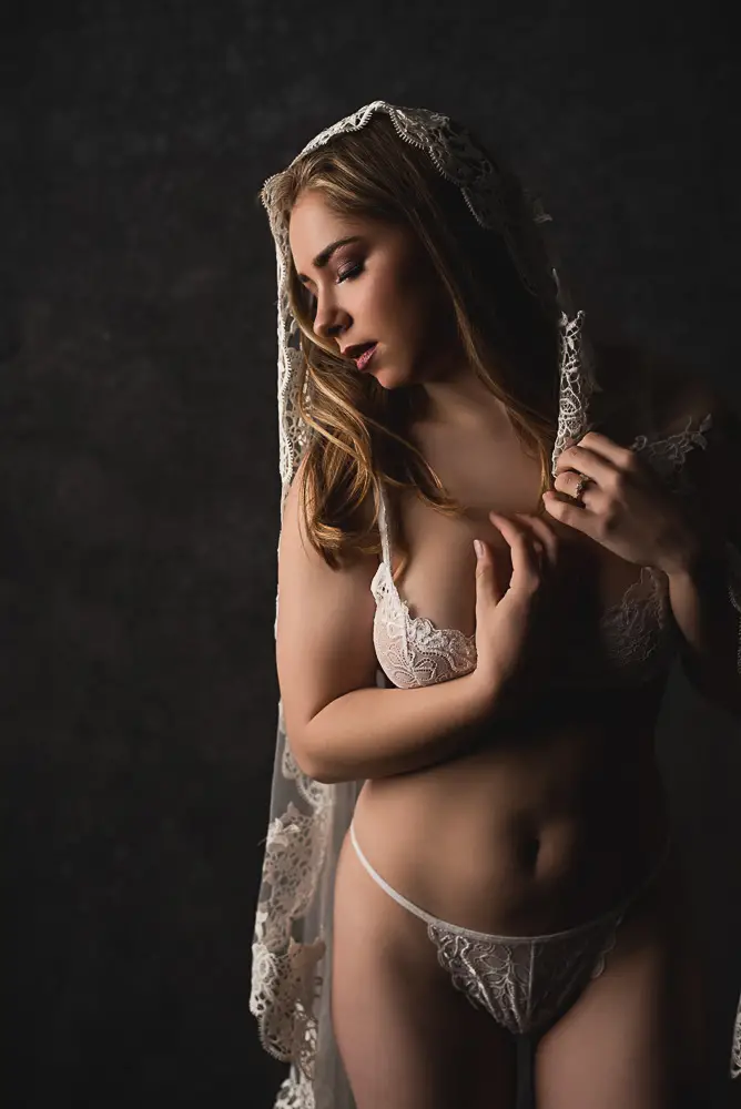 Luxury Bridal Boudoir photography portrait featuring a bride-to-be captured in studio, emphasizing empowerment and self-love for a wedding gift surprise.